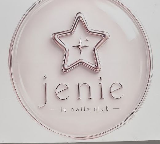 L’enseigne : étoile rose nacrée et le mot jenie.